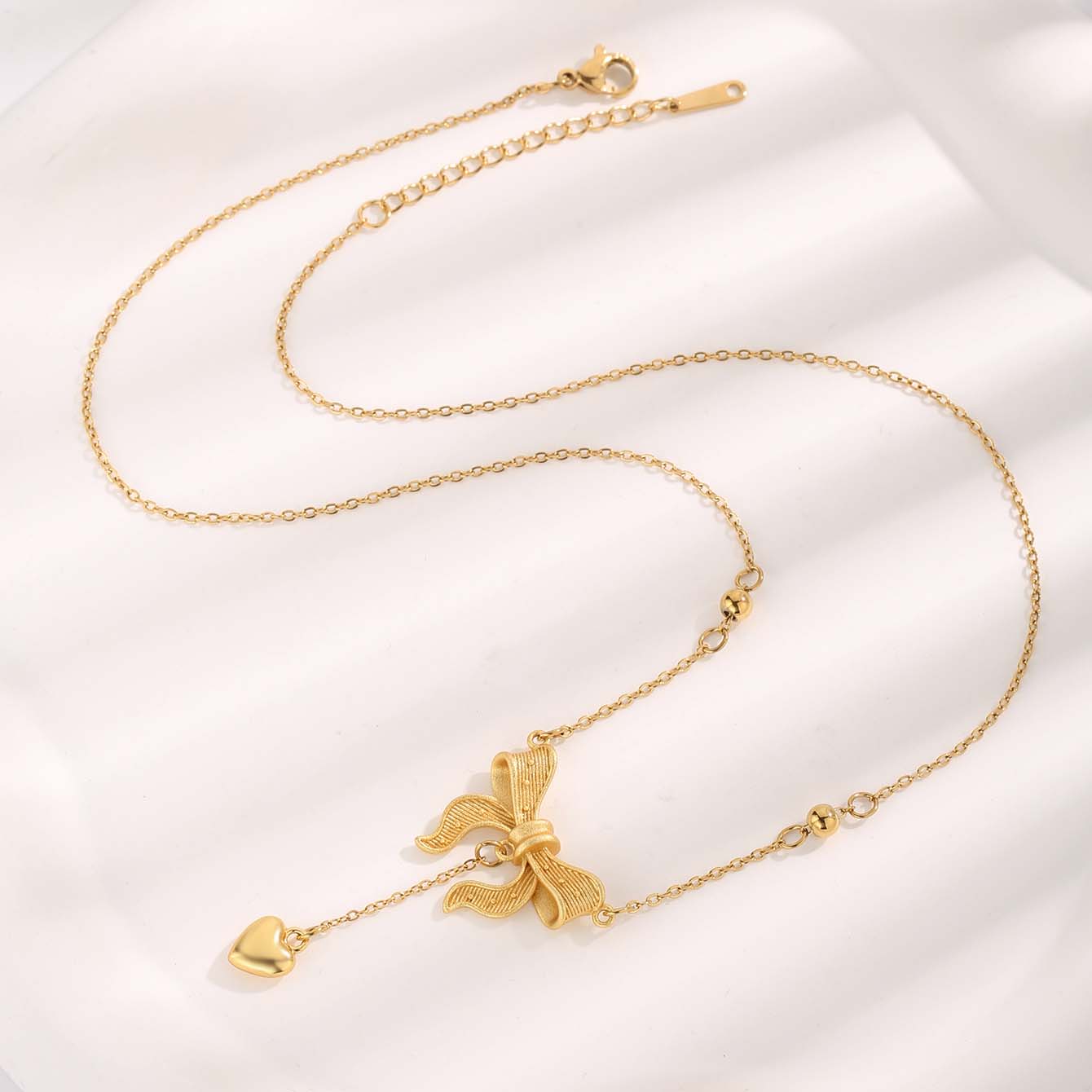 Cute Sweet Heart Shape Bow Knot Elk Titanium Steel Plating Inlay Resin Pearl Zircon Gold Plated Pendant Necklace display picture 4
