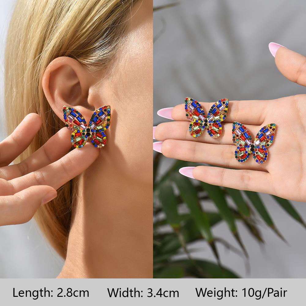 1 Pair Exaggerated Luxurious Shiny Round Heart Shape Wings Plating Inlay Copper Alloy Zinc Alloy Rhinestones Glass Ear Studs display picture 10