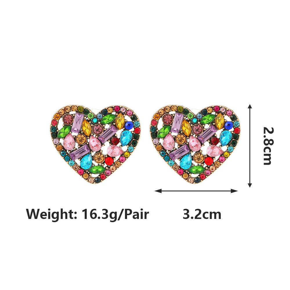 1 Pair Exaggerated Luxurious Shiny Round Heart Shape Wings Plating Inlay Copper Alloy Zinc Alloy Rhinestones Glass Ear Studs display picture 1