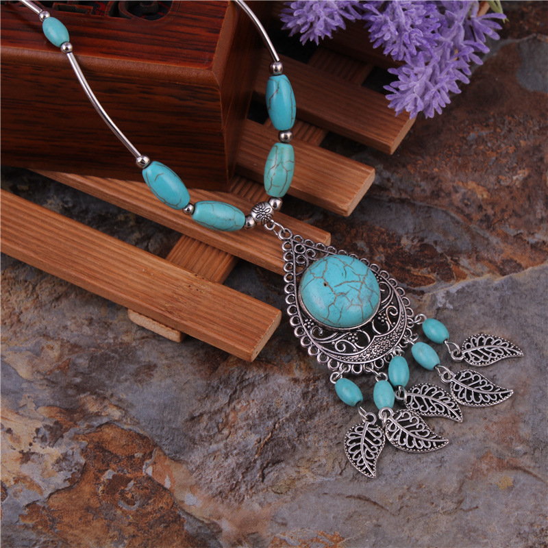 Wholesale Jewelry Retro Exaggerated Leaves Elephant Alloy Plastic Iron Turquoise Plating Hollow Out Inlay Pendant Necklace display picture 5