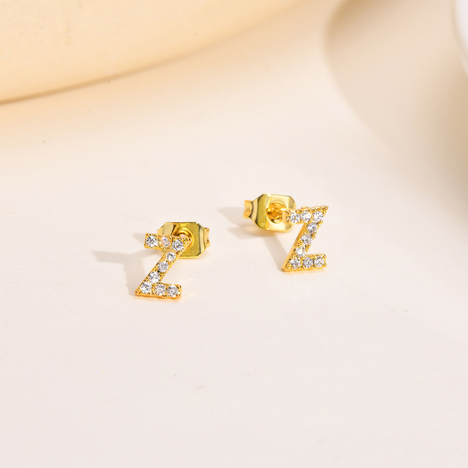 1 Pair Simple Style Letter Inlay Copper Zircon Gold Plated Ear Studs display picture 1