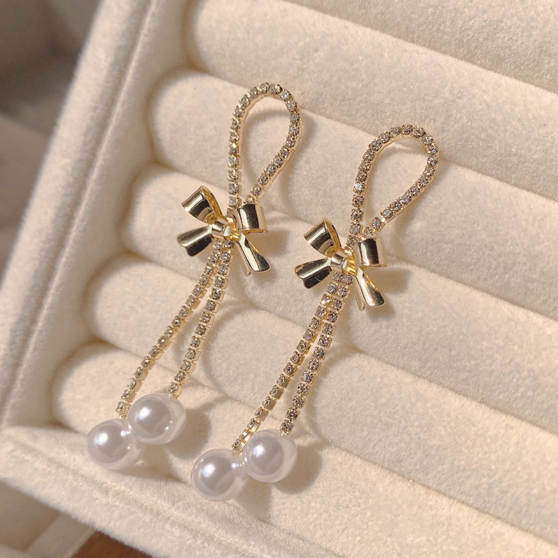 1 Pair Elegant Lady Classic Style Bow Knot Inlay Alloy Zircon Drop Earrings display picture 1