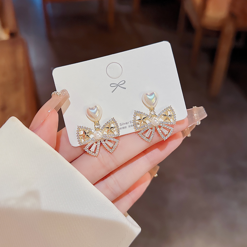 1 Pair Simple Style Bow Knot Inlay Alloy Zircon Drop Earrings display picture 7