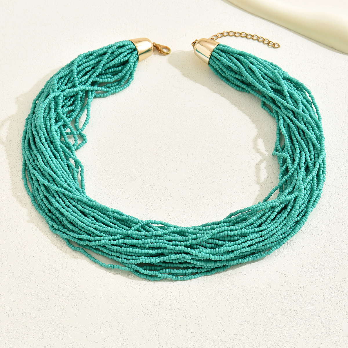 Ethnic Style Romantic Solid Color Round Plastic Seed Bead Beaded Chain Women's Layered Necklaces Sweater Chain display picture 11
