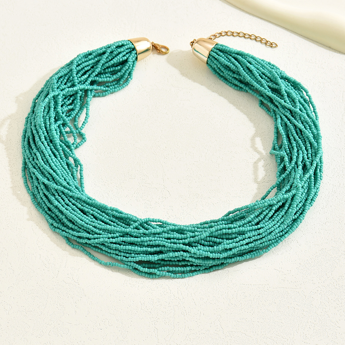 Style Ethnique Romantique Couleur Unie Rond Plastique Perle De Rocaille Perlé Chaîne Femmes Collier En Couches Chaîne De Chandail display picture 11