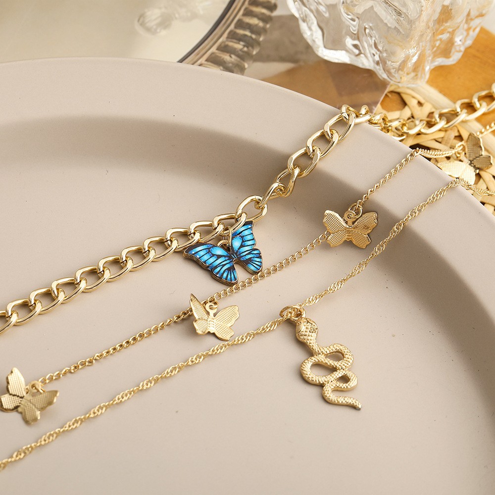 Retro Butterfly Gold Plated Alloy Wholesale Layered Necklaces display picture 9