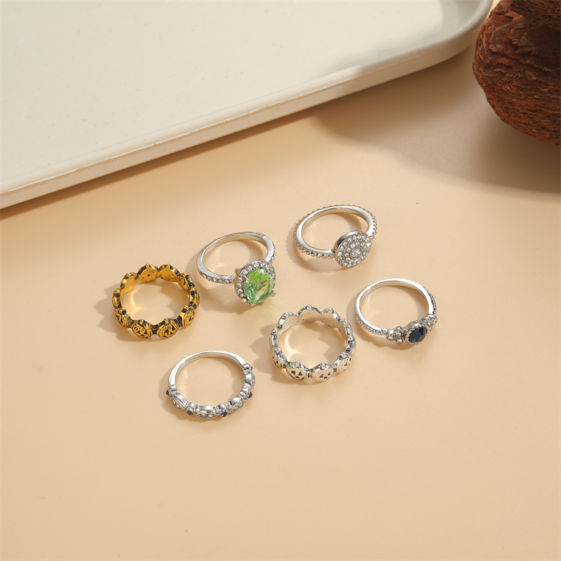 Commute Round Alloy Asymmetrical Plating Inlay Rhinestones Gold Plated Unisex Rings display picture 1