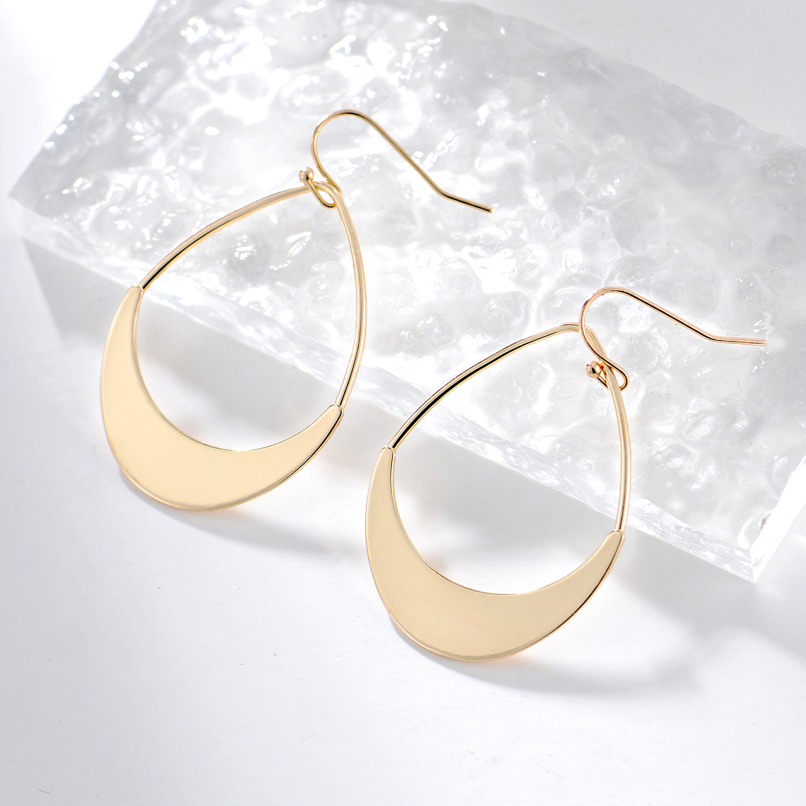 1 Pair Simple Style Water Droplets Plating Hollow Out Stainless Steel Gold Plated Silver Plated Drop Earrings display picture 1
