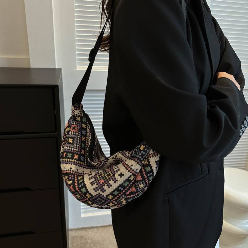 Women's Canvas Lingge Vintage Style Dumpling Shape Zipper Shoulder Bag Crossbody Bag display picture 1