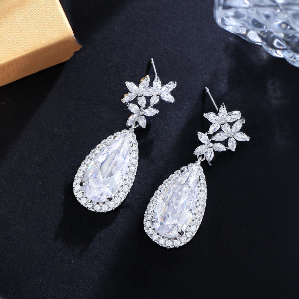 1 Pair Elegant Water Droplets Snowflake Plating Inlay Copper Artificial Gemstones Rhodium Plated Drop Earrings display picture 1