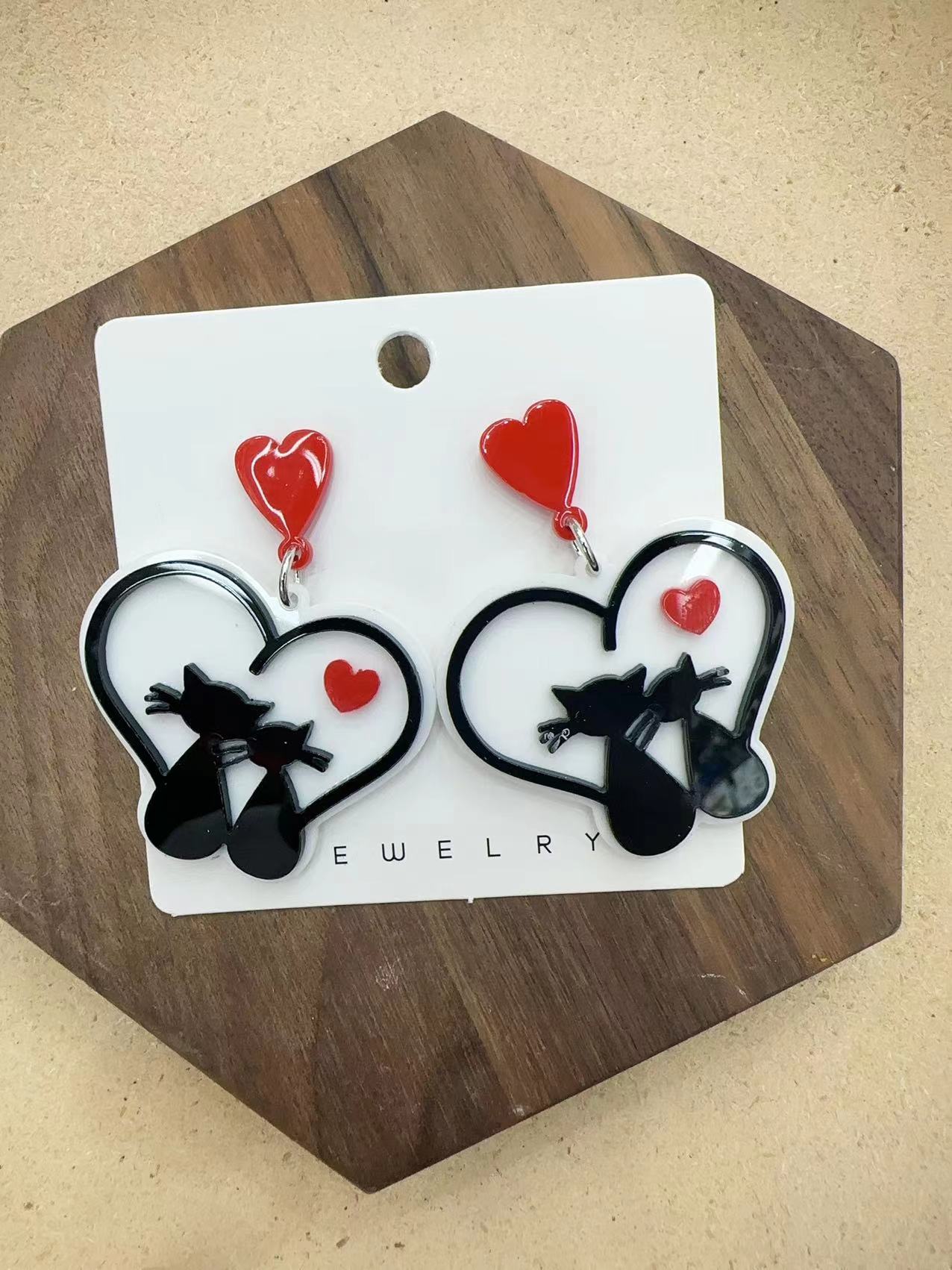 Wholesale Jewelry Fashion Astronaut Color Block Heart Shape Arylic No Inlaid Earrings display picture 9