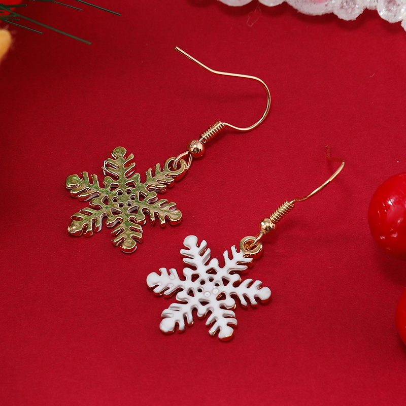 1 Pair Cute Snowflake Enamel Hollow Out Alloy Gold Plated Drop Earrings display picture 3