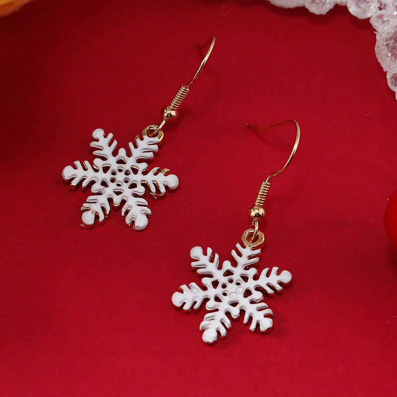 1 Pair Cute Snowflake Enamel Hollow Out Alloy Gold Plated Drop Earrings display picture 1