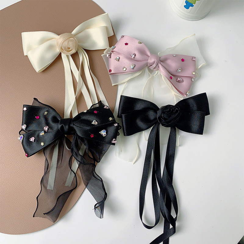 Sweet Shiny Bow Knot Alloy Cloth Inlay Artificial Rhinestones Hair Clip display picture 1