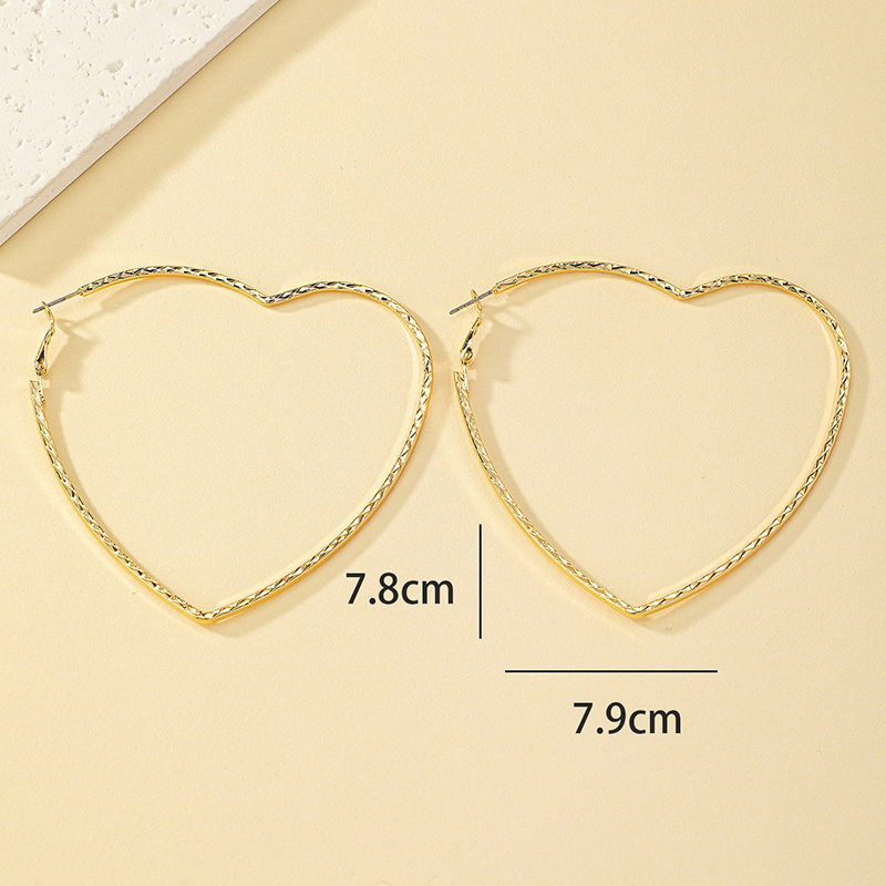 1 Pair Ig Style Simple Style Heart Shape Hollow Out Alloy 14k Gold Plated Earrings display picture 3