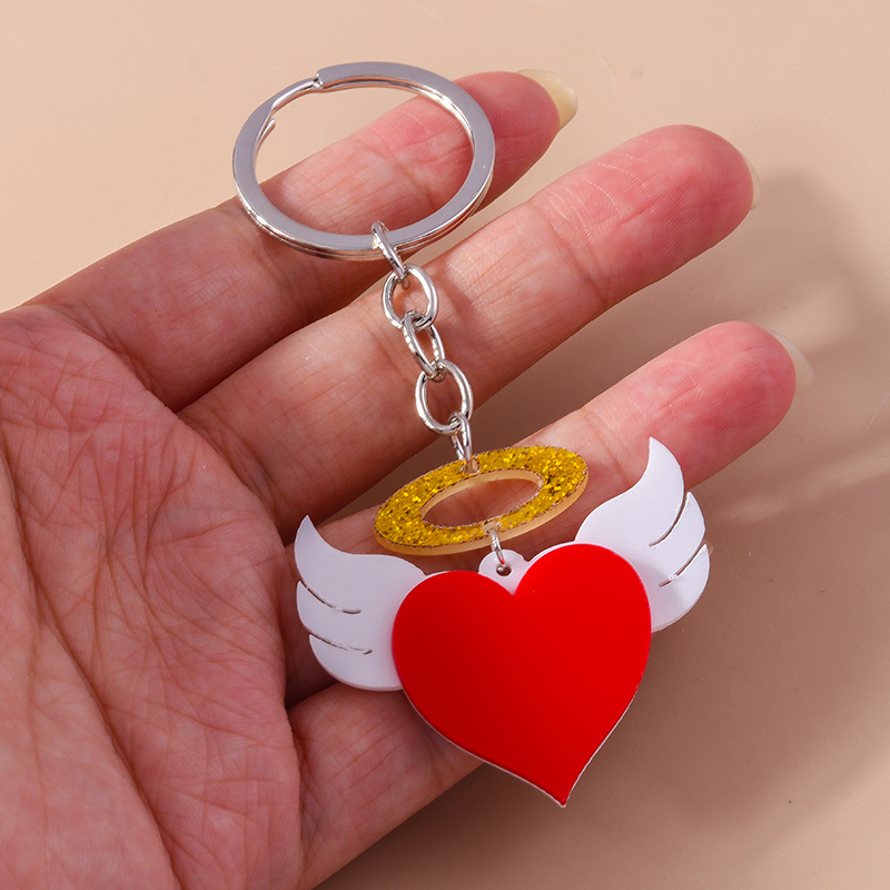 Cute Heart Shape Alloy Plastic Bag Pendant Keychain display picture 6
