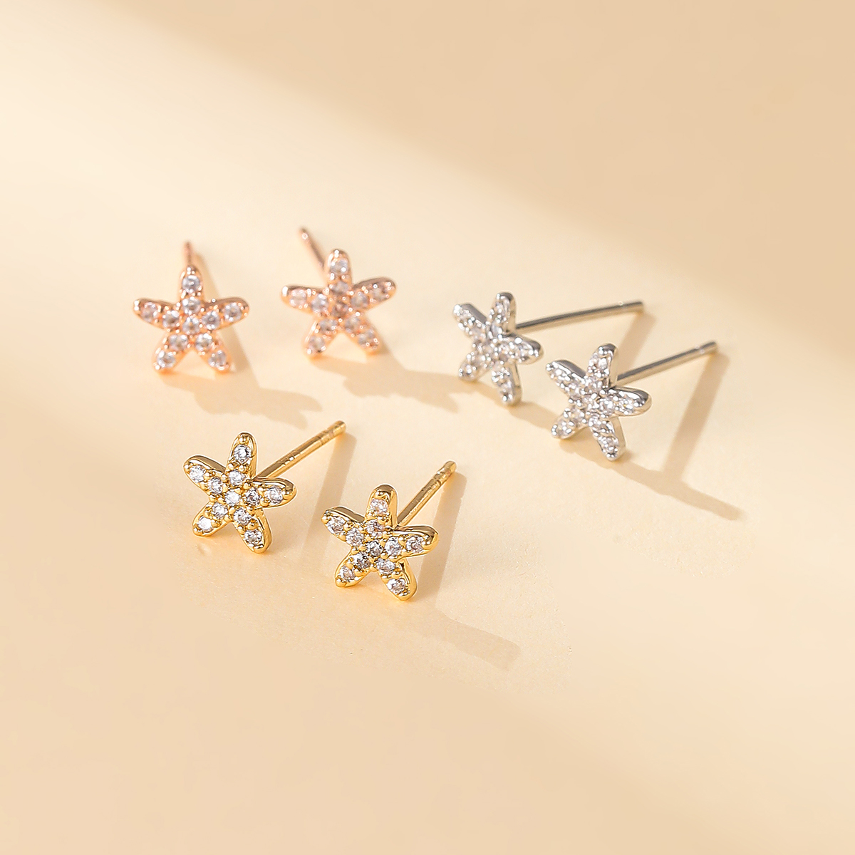 1 Pair Casual Simple Style Shiny Starfish Plating Inlay Copper Artificial Pearls Zircon 18k Gold Plated Ear Studs display picture 1
