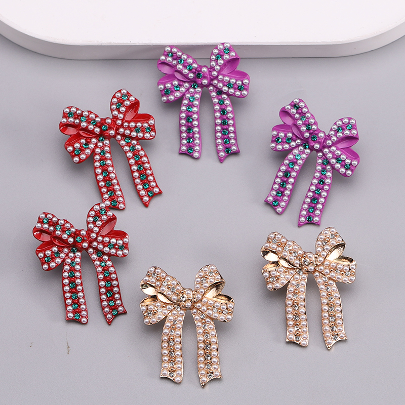 1 Pair Romantic Sweet Bow Knot Enamel Plating Alloy Zircon Gold Plated Ear Studs display picture 8