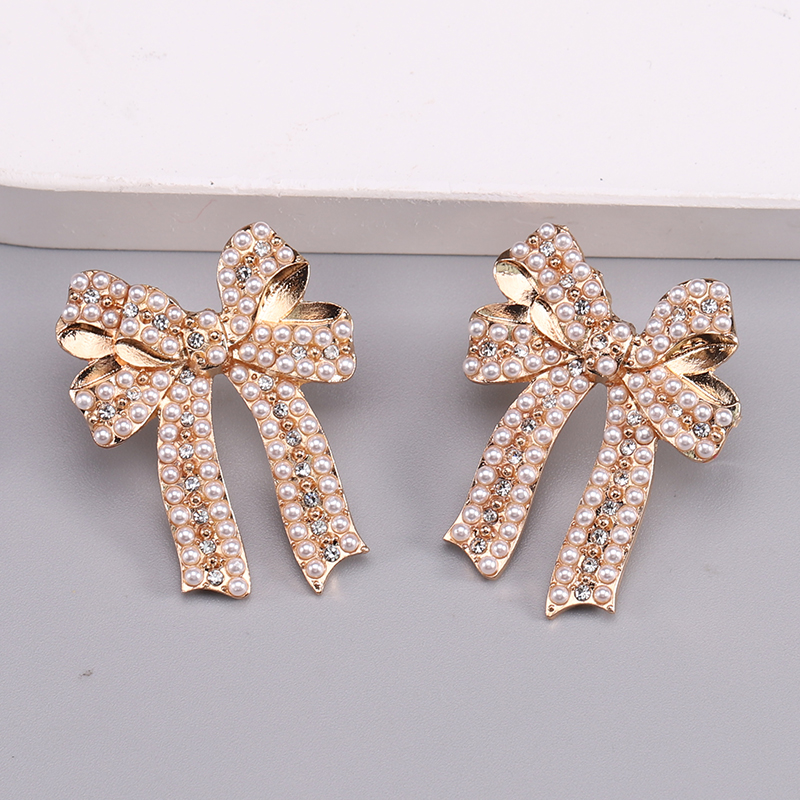 1 Pair Romantic Sweet Bow Knot Enamel Plating Alloy Zircon Gold Plated Ear Studs display picture 10