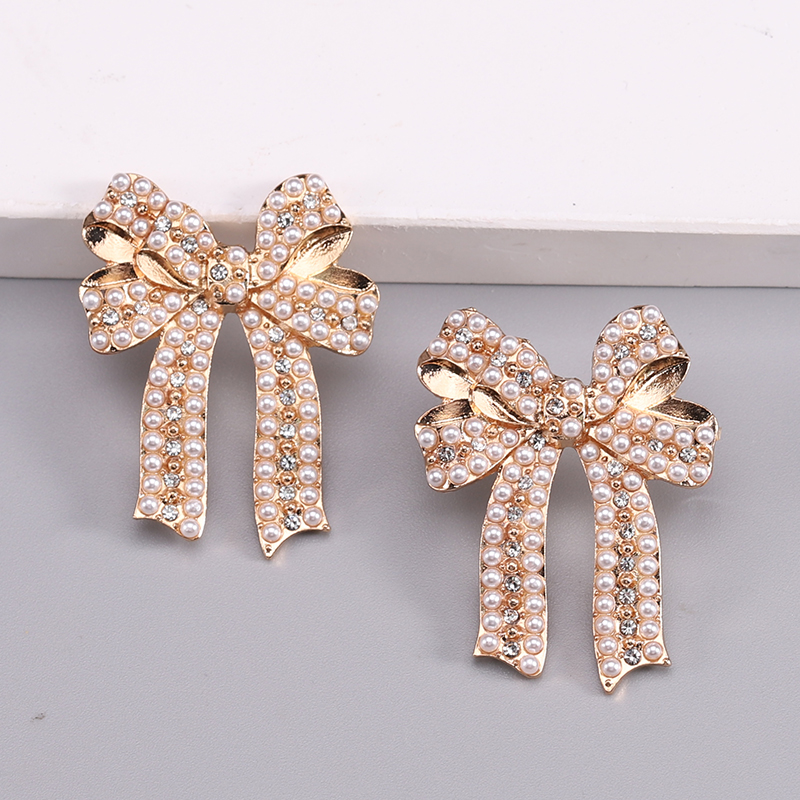 1 Pair Romantic Sweet Bow Knot Enamel Plating Alloy Zircon Gold Plated Ear Studs display picture 9