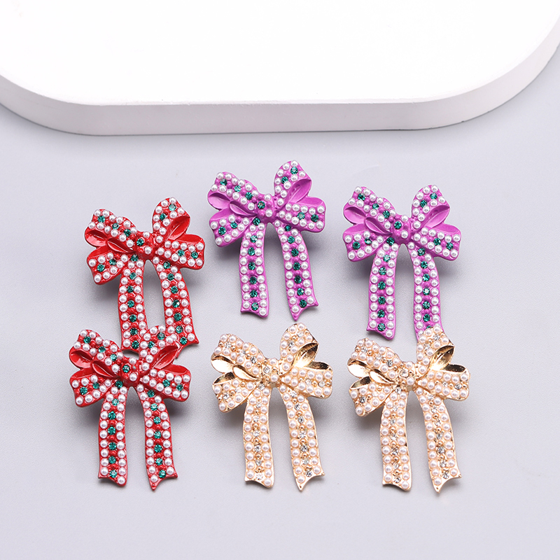 1 Pair Romantic Sweet Bow Knot Enamel Plating Alloy Zircon Gold Plated Ear Studs display picture 2