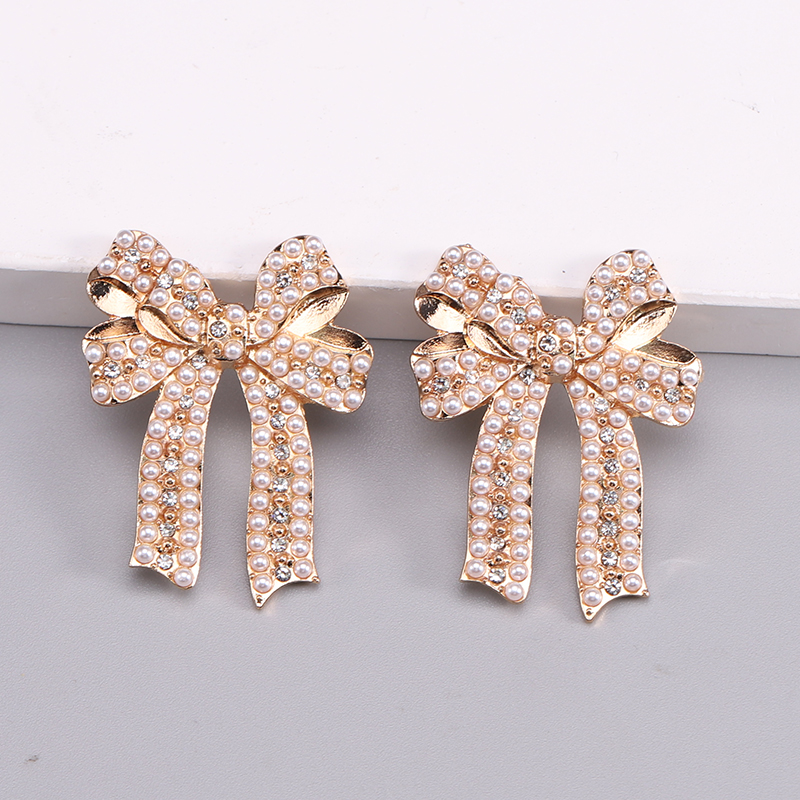 1 Pair Romantic Sweet Bow Knot Enamel Plating Alloy Zircon Gold Plated Ear Studs display picture 12