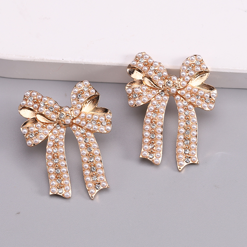 1 Pair Romantic Sweet Bow Knot Enamel Plating Alloy Zircon Gold Plated Ear Studs display picture 11