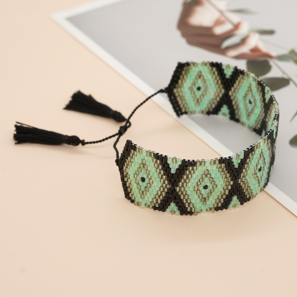 Bohemian Rhombus Seed Bead Rope Knitting Tassel Couple Drawstring Bracelets display picture 14
