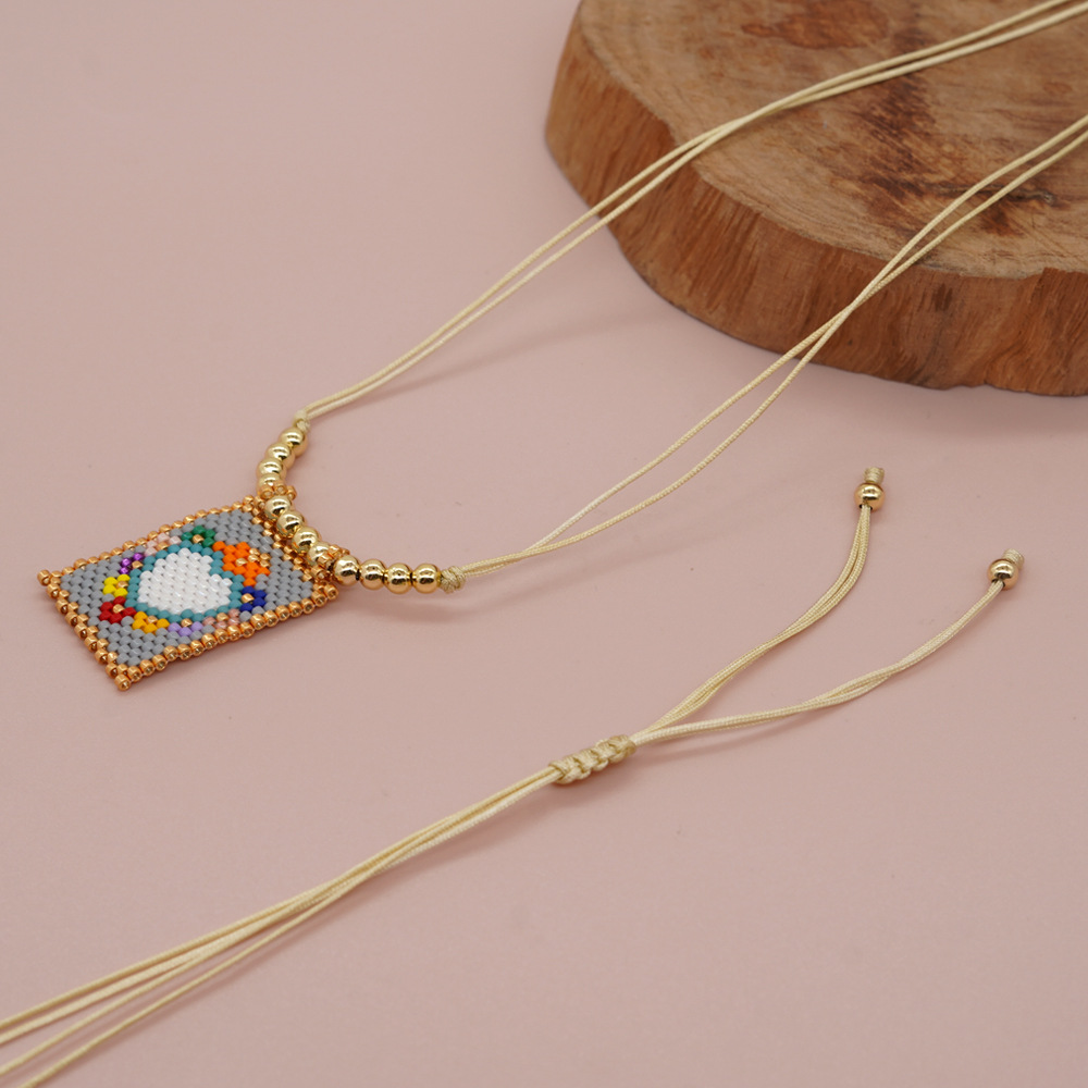 Bohemian Peach Heart Shape Crown Organic Glass Unisex Necklace Pendant display picture 8