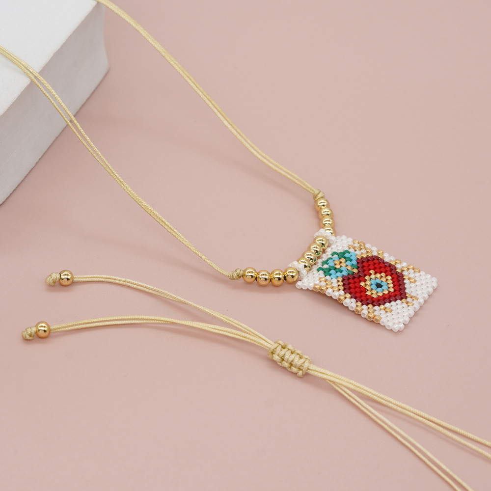 Bohemian Peach Heart Shape Crown Organic Glass Unisex Necklace Pendant display picture 9