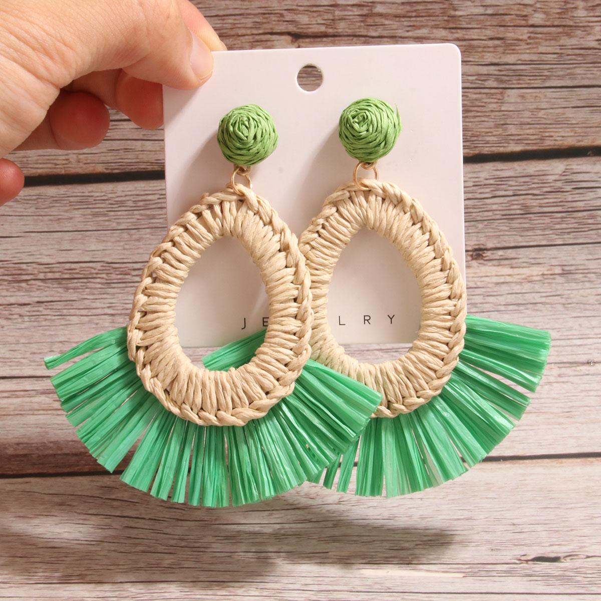 1 Pair Simple Style Artistic Water Droplets Braid Hollow Out Raffia Drop Earrings display picture 4
