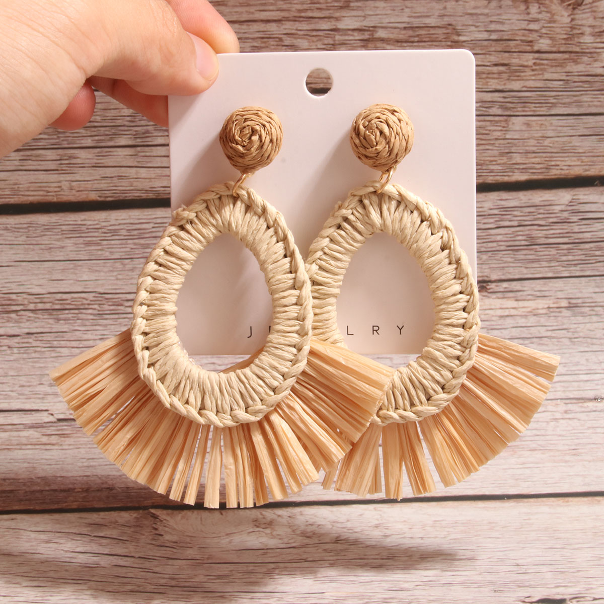 1 Pair Simple Style Artistic Water Droplets Braid Hollow Out Raffia Drop Earrings display picture 3