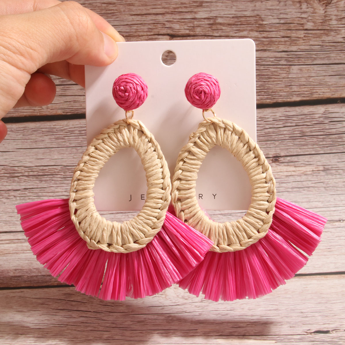 1 Pair Simple Style Artistic Water Droplets Braid Hollow Out Raffia Drop Earrings display picture 1