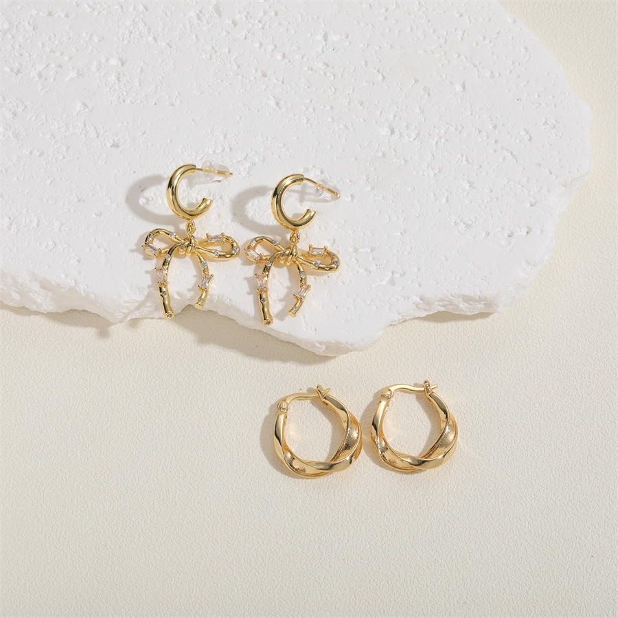 1 Pair Simple Style Twist Plating Copper 14k Gold Plated Hoop Earrings Drop Earrings display picture 7