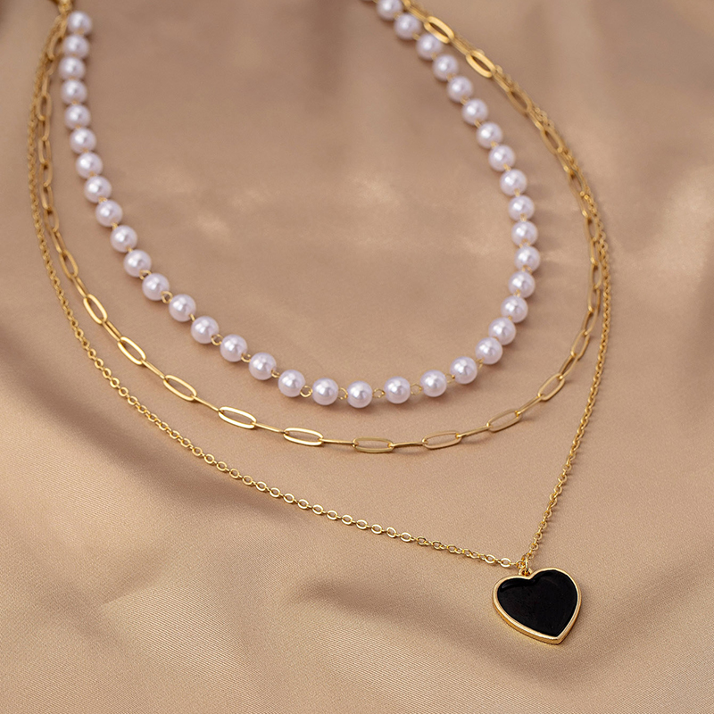 Simple Style Heart Shape Plastic Zinc Alloy Women's Three Layer Necklace display picture 1