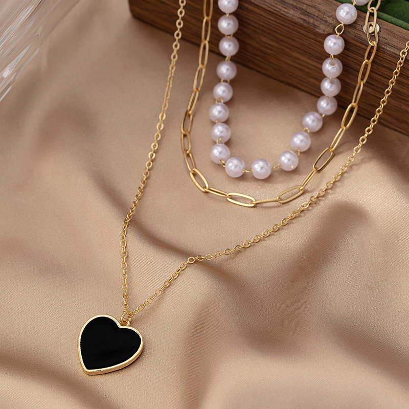 Simple Style Heart Shape Plastic Zinc Alloy Women's Three Layer Necklace display picture 3