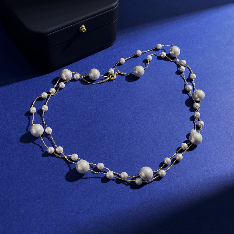 Elegant Pendeln Runden Kupfer Perle Pulloverkette Halskette display picture 2