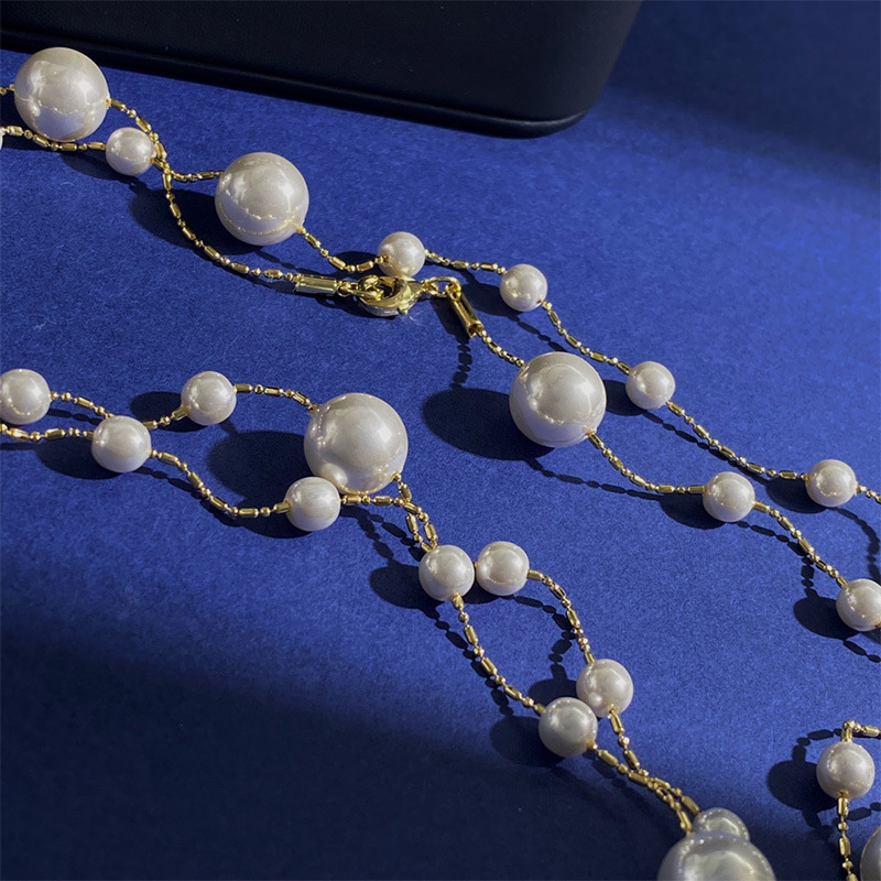 Elegant Pendeln Runden Kupfer Perle Pulloverkette Halskette display picture 5