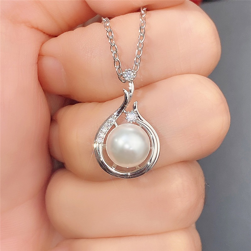 Simple Style Water Droplets Copper Plating Hollow Out Inlay Zircon White Gold Plated Pendant Necklace display picture 4