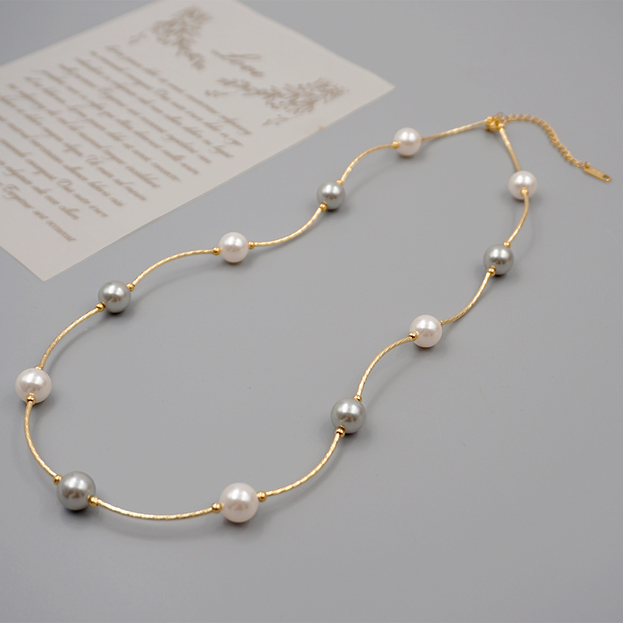Wholesale Classic Style Solid Color Imitation Pearl Titanium Steel Copper Beaded Plating Gold Plated Necklace display picture 3