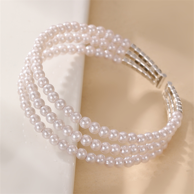 Estilo Moderno Estilo Simple Triángulo Gotitas De Agua Nudo De Lazo Piedras Preciosas Artificiales Perla Artificial Embutido Diamantes De Imitación Perla Mujeres Brazalete display picture 23