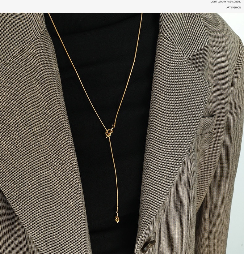 Casual Simple Style Knot Titanium Steel Plating Metal Button Sweater Chain display picture 10
