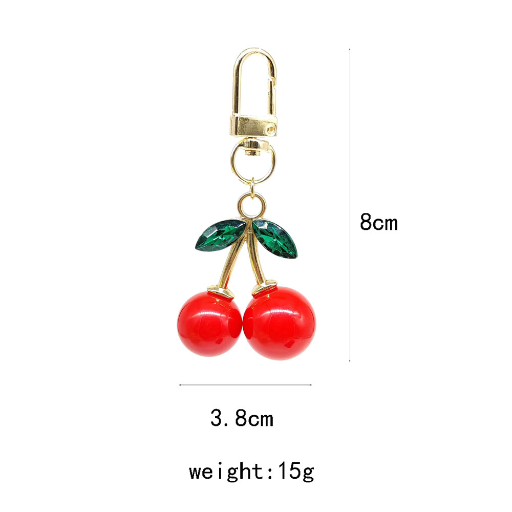 Elegant Glam Lady Fruit Alloy Plating Metal Inlay Resin Glass Stone Bag Pendant Keychain display picture 1