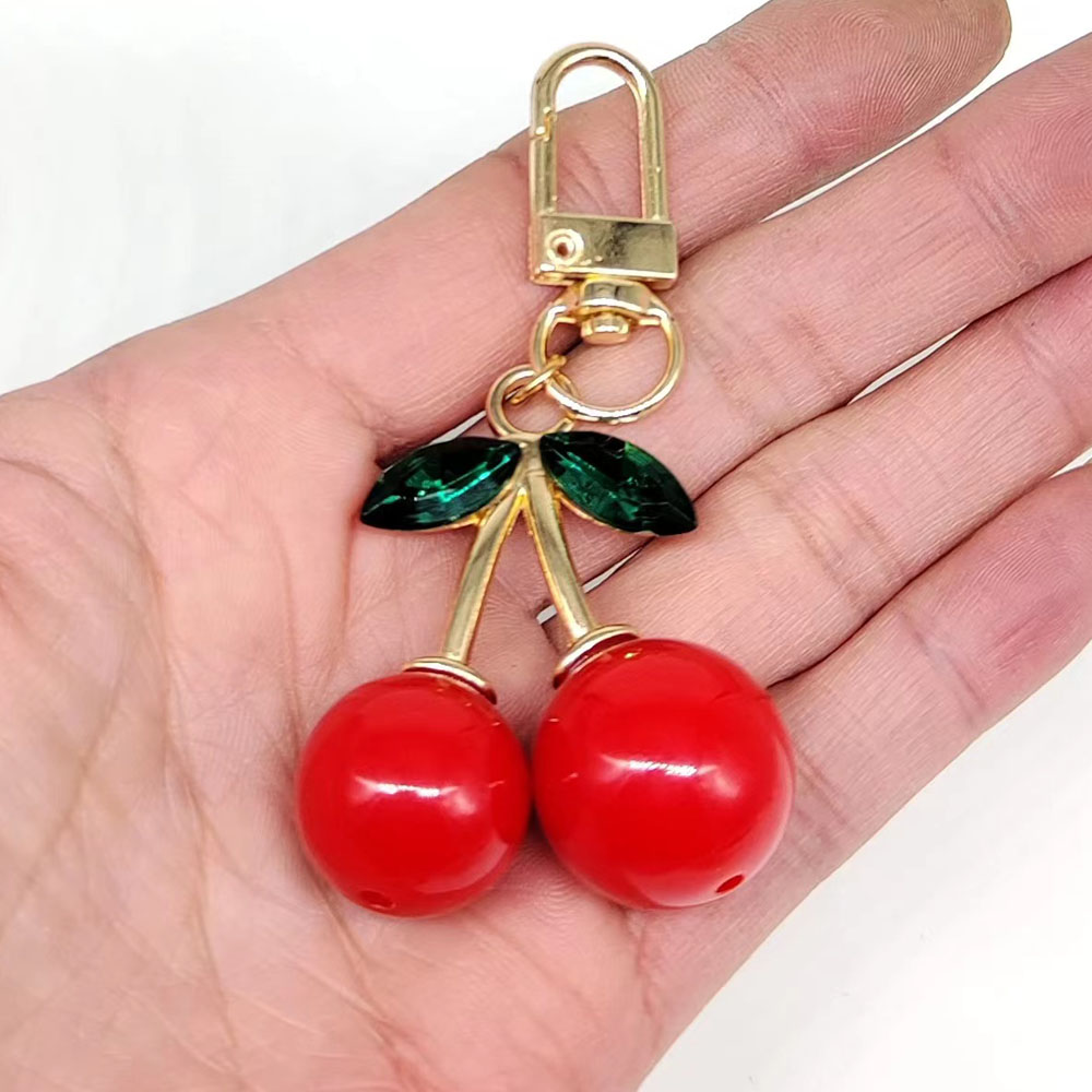 Elegant Glam Lady Fruit Alloy Plating Metal Inlay Resin Glass Stone Bag Pendant Keychain display picture 2
