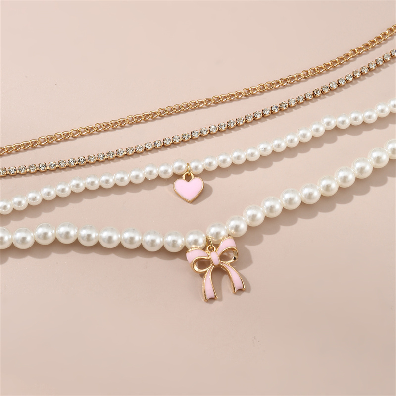 Princess Sweet Heart Shape Bow Knot Artificial Pearl Alloy Beaded Plating Inlay Rhinestones Girl's Necklace display picture 4