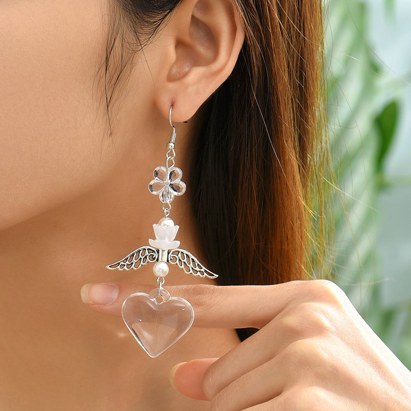 1 Pair Casual Simple Style Heart Shape Wings Flower Plating Hollow Out Arylic Drop Earrings display picture 1