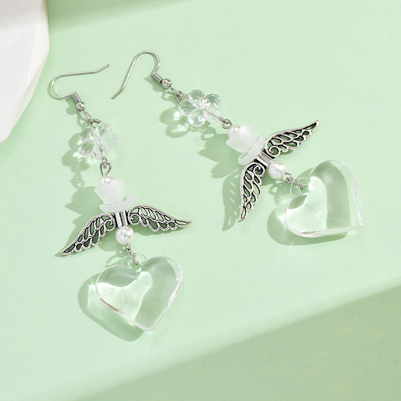 1 Pair Casual Simple Style Heart Shape Wings Flower Plating Hollow Out Arylic Drop Earrings display picture 6