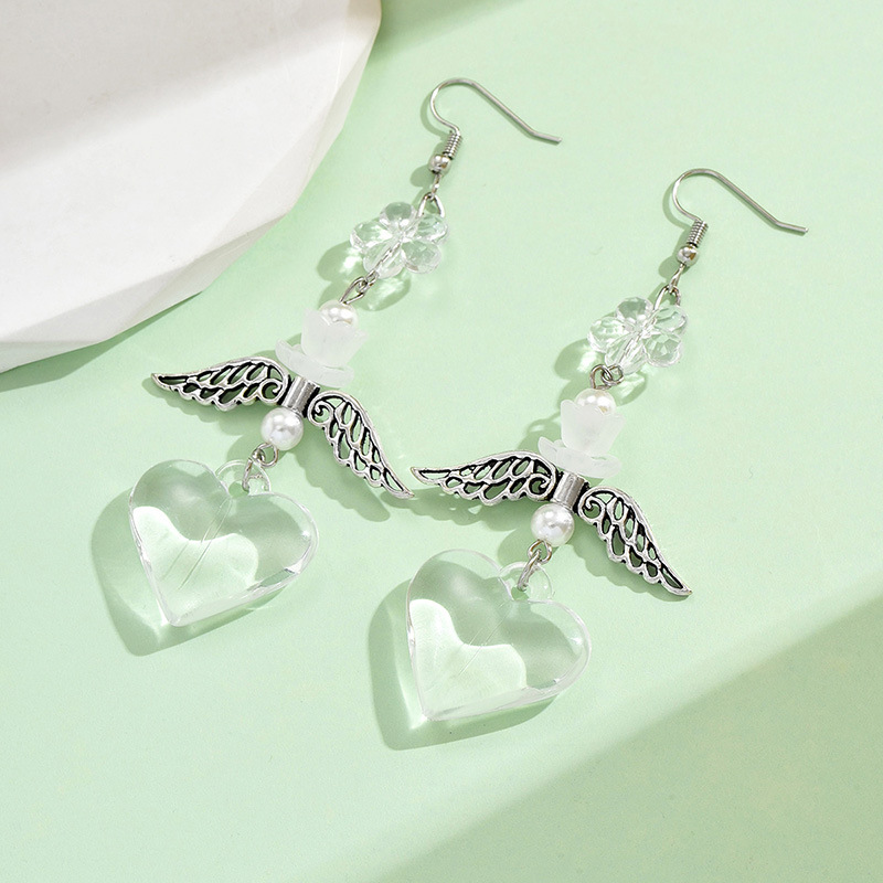 1 Pair Casual Simple Style Heart Shape Wings Flower Plating Hollow Out Arylic Drop Earrings display picture 7