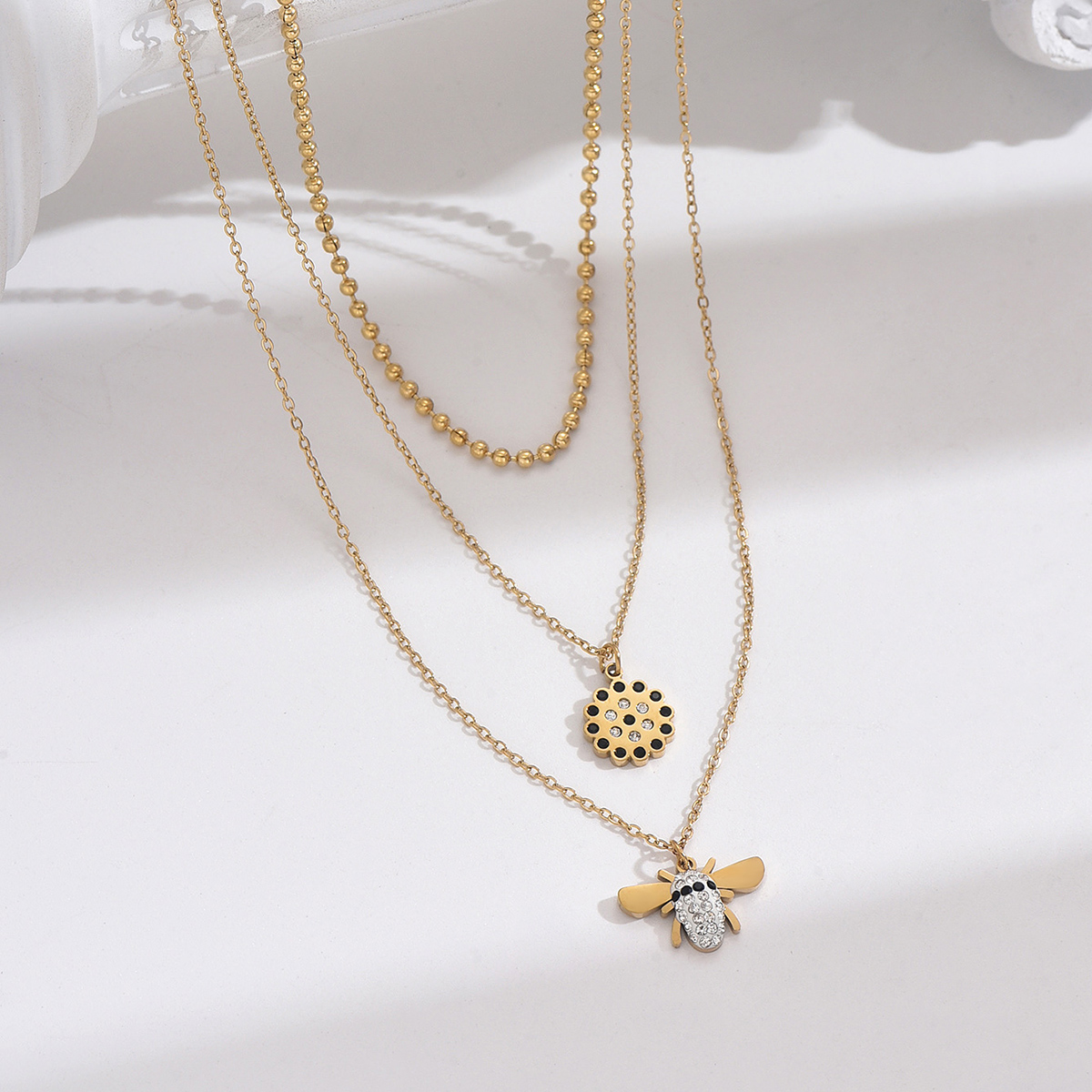 304 Stainless Steel Arylic Imitation Pearl 14K Gold Plated Elegant Simple Style Classic Style Inlay Round Bee Butterfly Zircon Layered Necklaces display picture 2
