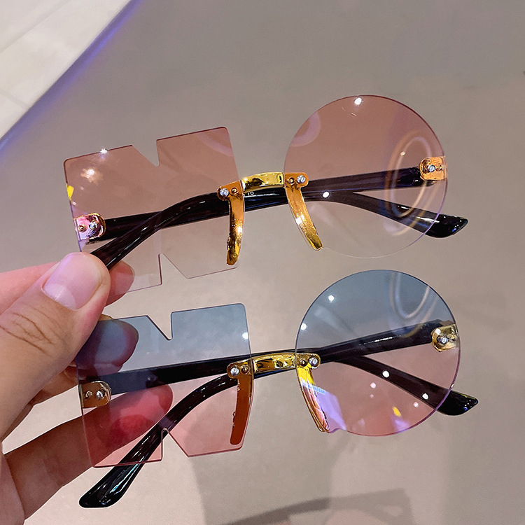 Children's Sunglasses New Frameless Irregular Personality Sunglasses Trendy Baby Party Sunglasses display picture 1